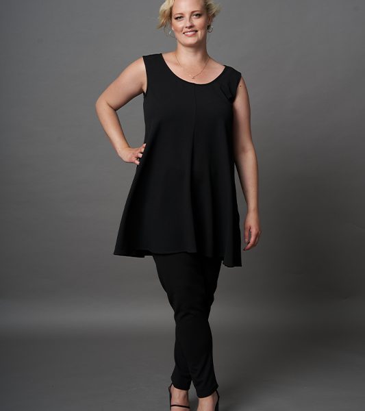 A plus size women's black sleeveless scoop neck top with relaxed swing silhouette