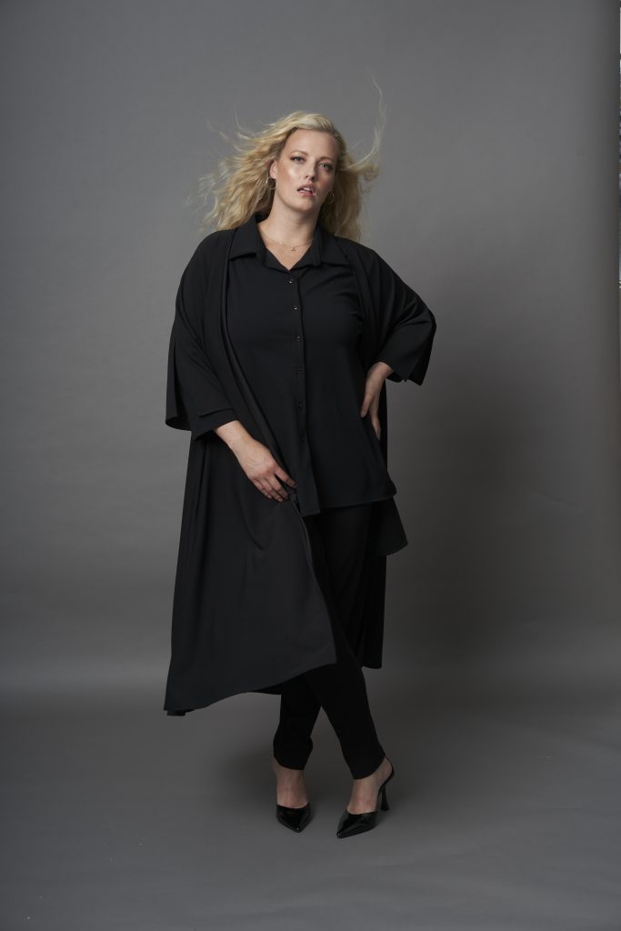 A midi Length Kimono Jacket in black made of scuba crepe, with side slits drops from One Six clothing.